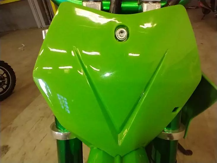 Kids Cross Numerokilpi vihreä - Kids Cross - KMWUOSA067 - 1